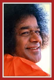 Sri Sathya Sai Baba smiling with radiant divine love always