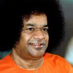 Smiling Bhagawan Sri Sathya Sai Baba portrait with serene expression
