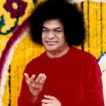 Sri Sathya Sai Baba in red robe