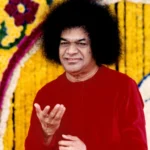 Sri Sathya Sai Baba in red robe