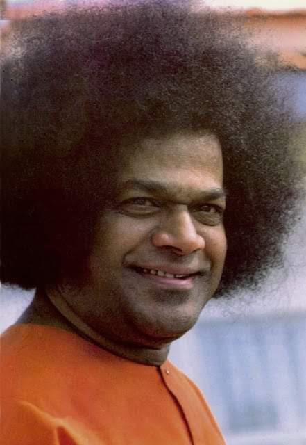 Sri Sathya Sai Baba smiling radiantly with divine loving presence always