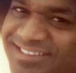 Close-up smiling Bhagawan Sri Sathya Sai Baba divine compassionate face